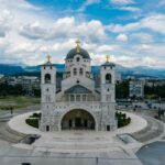 Stunning view of an Orthodox cathedral in Podgorica, Montenegro under a cloudy sky.